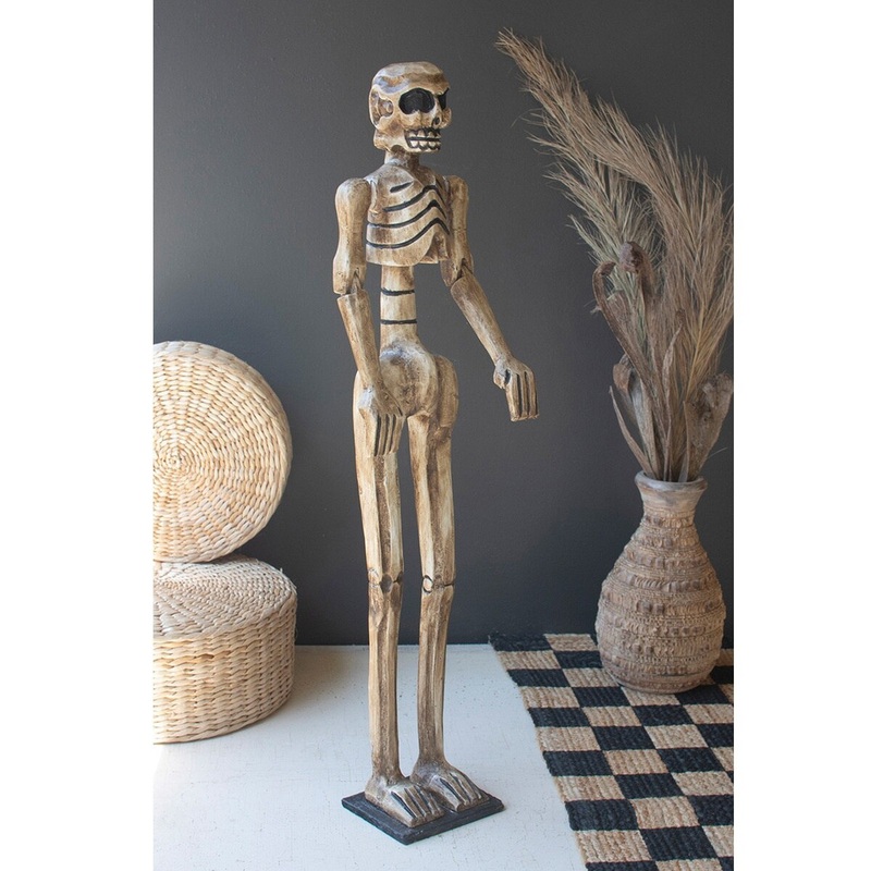 Wood-Carved Skeleton on a Base
